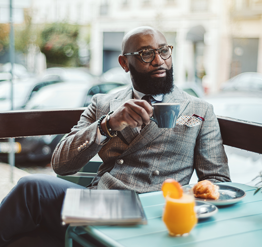 Man Drinking Coffee at Restaurant 500 x 530